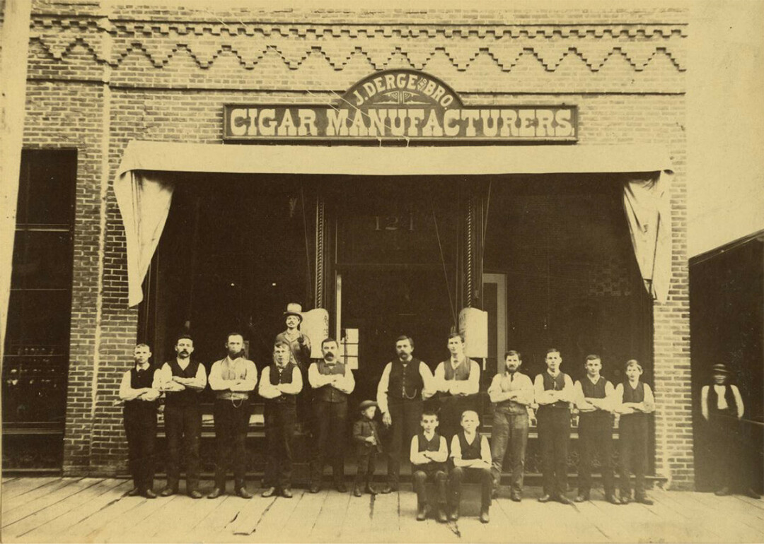 BROS AND DUDES. tle Group of men outside J. Derge & Bro. Cigar Manufacturers