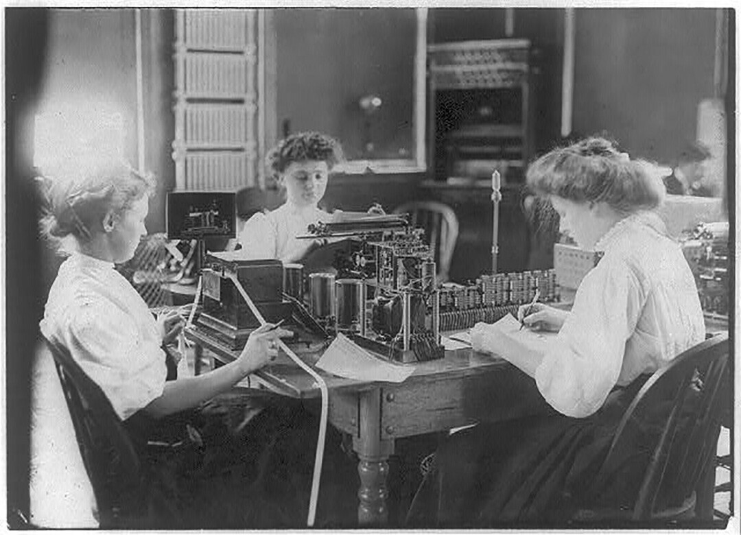 Women use telegraphy equipment in this circa 1908 photo in Cin